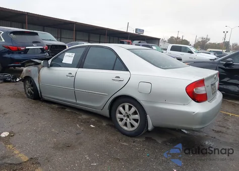 2003 Toyota Camry Xle z USA, uszkodzony, nr VIN 4T1BE32K73U714064